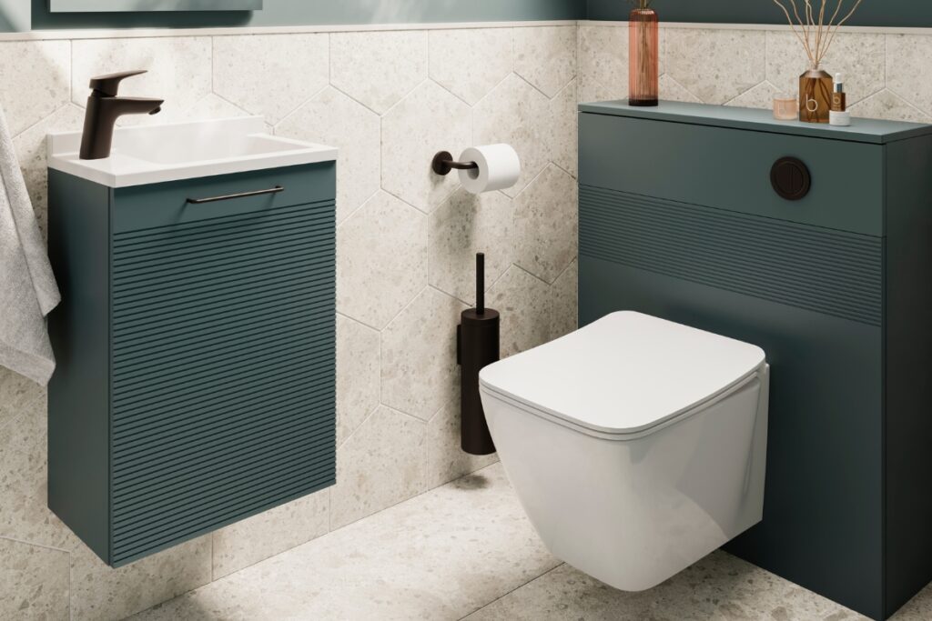 Compact modern bathroom with a dark teal floating vanity and a matching concealed cistern unit for a wall-hung toilet.