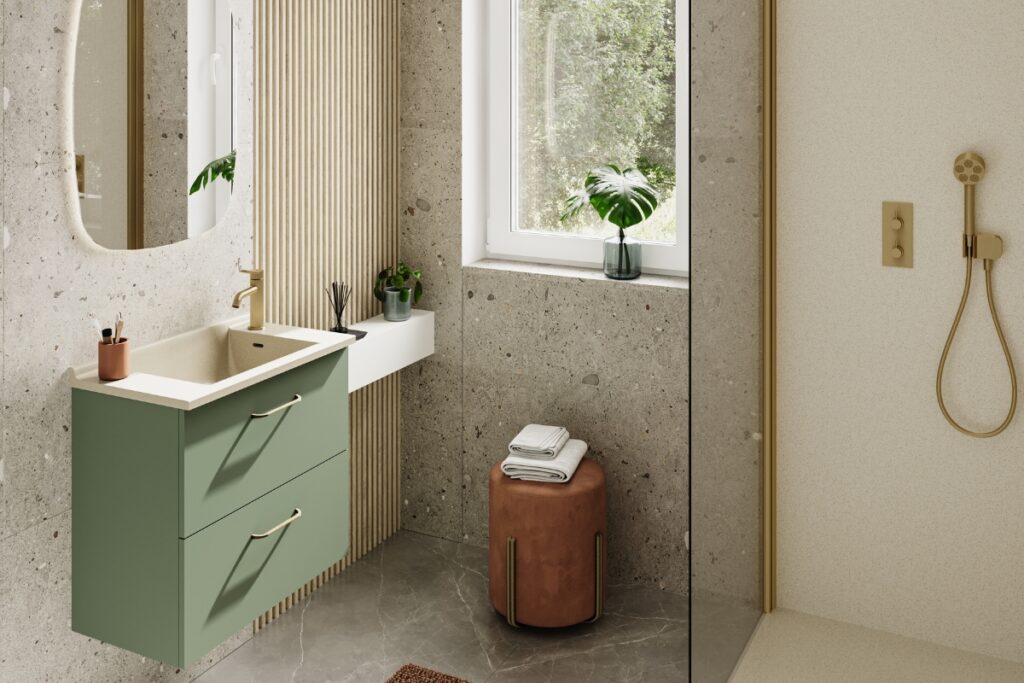 Stylish modern ensuite featuring a floating sage green vanity, stone-look tiles, and a gold fixed shower head and mixer.